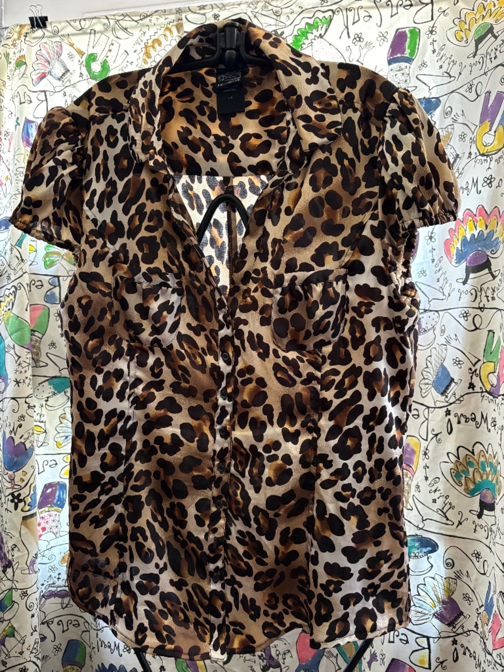 THK poly/ spandex leopard print cap sleeve blouse